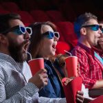 watching cinema in theatre
